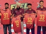 Players with their jersey during the event in Ludhiana on Sunday. (HT)