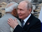 Russian President Vladimir Putin, right, and Prime Minister Narendra Modi embrace each other during their meeting on the sidelines of the SCO in Bishkek, Kyrgyzstan, on Monday. (Pyotr Kovalev/Pool Sputnik Kreml)
