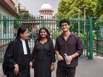 Cockroach Janta Party (CJP) national spokesperson Saurabh Das, right, along with party leader Ratna Singh, centre, outside the Supreme Court, in New Delhi, Tuesday, Aug. 18, 2026. 