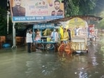 Waterlogged street at Aliganj in Lucknow on Monday. (DEEPAK GUPTA/HT PHOTO)