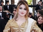Sandeep Khosla reacts to Urvashi Rautela's Cannes 2026 look, a copy of Gigi Hadid's iconic 2023 NMACC saree (left). (File Photo)