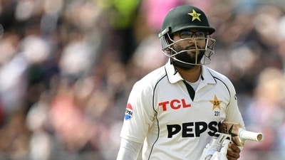 Pakistan's Imam-ul-Haq reacts as he walks back to the pavilion having lost his wicket without scoring on the day three of the first test match between England and Pakistan (AFP)