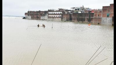Floodwater near Chhota Baghada locality in Prayagraj on Monday. (HT Photo)