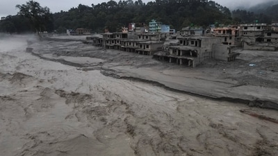 A drone view of the Trishuli river flowing past damaged buildings covered in mud after the deadly flash floods and mudslide, at Devighat, Nuwakot district, Nepal (REUTERS)