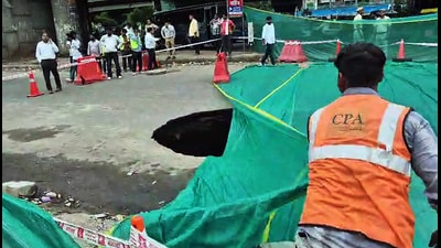 Officials said the damaged road will be repaired only after the pipeline is fully tested to prevent another cave-in at the busy junction. (ANI Video Grab) Officials said the damaged road will be repaired only after the pipeline is fully tested to prevent another cave-in at the busy junction. (ANI Video Grab)