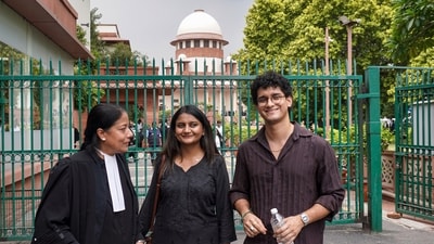 Cockroach Janta Party (CJP) national spokesperson Saurabh Das, right, along with party leader Ratna Singh, centre, outside the Supreme Court, in New Delhi, Tuesday, Aug. 18, 2026. (PTI)