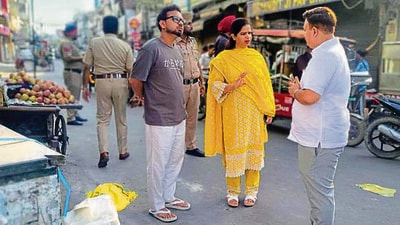 The mayor and MC chief during the inspection in Ludhiana on Monday. (HT photo)