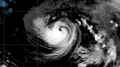This satellite image released by NOAA shows Hurricane Karina strengthening off the southern tip of Baja California on Sunday, Aug. 30, 2026. (NOAA via AP)