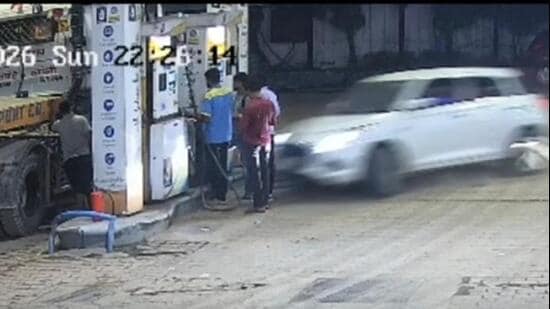 CCTV footage from the station, which was widely shared on social media, showed three to four people standing near a fuel dispenser when a speeding Maruti Swift suddenly hit them. (HT Photo/Video Grab)