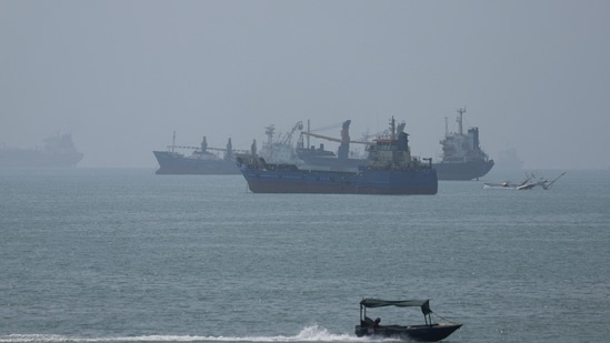 Vessels in the Strait of Hormuz are visible near the beach of Bandar Abbas, Iran.