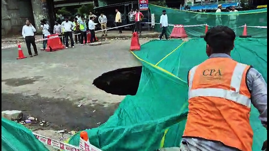 Officials said the damaged road will be repaired only after the pipeline is fully tested to prevent another cave-in at the busy junction. (ANI Video Grab)
