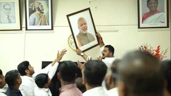 The group allegedly removed Modi’s photograph, threatened staff, raised slogans and created a commotion. (HT)