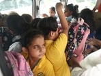 An overcrowded vehicle carrying school children in Lucknow recently (HT File Photo)