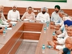 BJP’s Punjab in-charge Satish Poonia chairing a party meeting in Chandigarh on Monday. (HT)