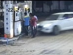 CCTV footage from the station, which was widely shared on social media, showed three to four people standing near a fuel dispenser when a speeding Maruti Swift suddenly hit them. (HT Photo/Video Grab)