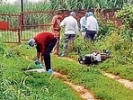 Forensic team and police personnel inspect the encounter site in Shamli on Monday. (HT Photo)