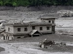 A mud-covered building following a flash flood at Trishuli in Nuwakot district, Nepal, August 26, 2026. 