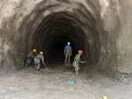 Rescue personnel work at a hydropower tunnel site, in the aftermath of deadly flash floods and a mudslide, in Rasuwa district, Nepal.