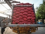 New Delhi: Workers transfer sacks of onions from the ‘Kanda Express’ onto trucks after the special goods train arrived from Nashik, Maharashtra, at Adarsh Nagar Railway Station in New Delhi, India, on August 28, 2026. (HT File Photo/Sanchit Khanna)