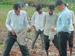Officials and rescue workers at the site of the blast searching for human remains in Kaushambi on September 1. (HT photo)