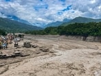 In this image received on Aug. 26, 2026, A torrent of muddy water flows through the Trishuli River following a flash flood triggered by the Lende river, and merges into the Bhote Koshi river, in Trishuli, Nepal. (PTI Photo)(PTI08_26_2026_000537B)