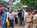 Police and locals at the site of latest blast at an illegal,firecracker factory in UP’s Kaushambi district on August 31. (HT photo)