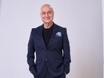 Anupam Kher shared pictures of his new look.
