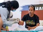 Sonam Wangchuk being attended by a medical professional during a protest by Cockroach Janata Party (CJP) at the Jantar Mantar in New Delhi.