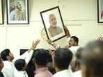 The group allegedly removed Modi’s photograph, threatened staff, raised slogans and created a commotion. (HT)