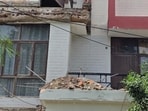 The second-floor balcony allegedly gave way during an inspection, bringing down balconies on the floors below in a domino effect. (HT)