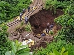 Workers carry out restoration and repair work on the UNESCO World Heritage Kalka-Shimla railway track near Parwanoo, in Solan district, Himachal Pradesh, on Monday. (PTI)