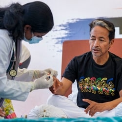 Sonam Wangchuk being attended by a medical professional during a protest by Cockroach Janata Party (CJP) at the Jantar Mantar in New Delhi.