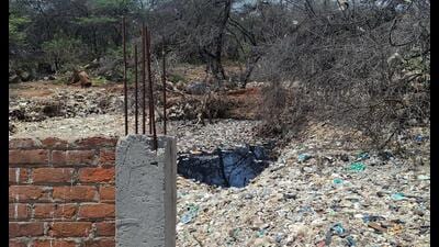 Leachate seen leaking into the Aravalli forest ranges in Gurugram, earlier in June. (HT)