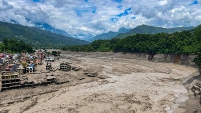 In this image received on Aug. 26, 2026, A torrent of muddy water flows through the Trishuli River following a flash flood triggered by the Lende river, and merges into the Bhote Koshi river, in Trishuli, Nepal. (PTI Photo)(PTI08_26_2026_000537B) (Handout)