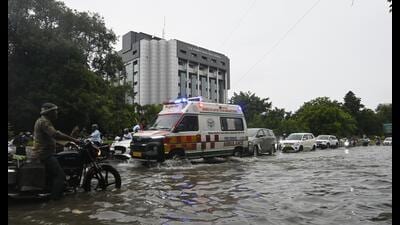 Rainwater submerged the road, affecting vehicular movement and making commuting difficult outside RML Hospital in Vibhuti Khand, Lucknow, on Tuesday. (Deepak Gupta/HT)