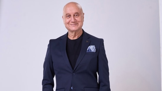 Anupam Kher shared pictures of his new look.