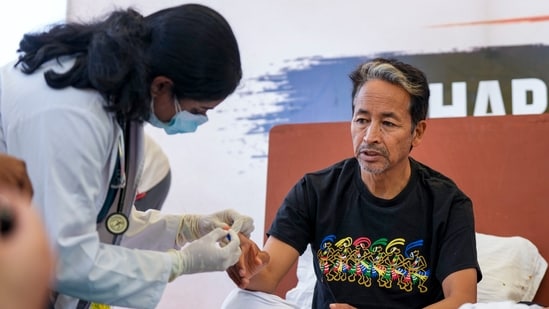 Sonam Wangchuk being attended by a medical professional during a protest by Cockroach Janata Party (CJP) at the Jantar Mantar in New Delhi.