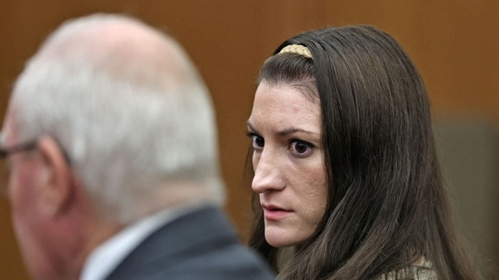 Lindsay Clancy looks to her lawyer Kevin Reddington, on the day the jury in her murder trial said to Judge Sullivan that they cannot reach a verdict September 1.