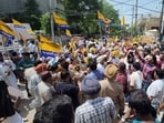 Aam Aadmi Party workers and local leadership staged a protest and raised slogans against the BJP outside the party's Bathinda office. (Sanjeev Kumar/ht)