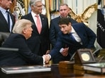 US President Donald Trump shakes hands with Richard Ascroft, CEO North America of Sun Pharma, during an announcement on Healthcare Affordability in the Oval Office of the White House in Washington, DC on August 31, 2026. (AFP)