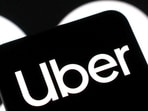 Uber shares rise after the company announces 3,300 job cuts.