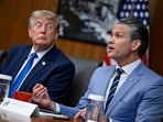 FILE PHOTO: U.S. President Donald Trump listens as Secretary of Defense Pete Hegseth speaks during a cabinet meeting at Camp David in Thurmont, Maryland, U.S., July 31, 2026. REUTERS/Daniel Heuer/File Photo(REUTERS)