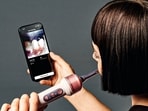 The main attraction? A microscopic 100,000-pixel camera set near the bristles that captures 28 frames per second.