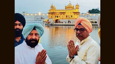 During his visit, Poonia paid obeisance at the Durgiana Temple, Golden Temple and Central Valmiki Tirath. (HT PHOTO)