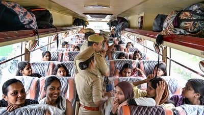 Police officers inspect a passenger bus during a special checking drive launched to enforce safety norms following the alleged sexual assault of a minor girl in a moving bus, in Noida. (PTI) Police officers inspect a passenger bus during a special checking drive launched to enforce safety norms following the alleged sexual assault of a minor girl in a moving bus, in Noida. (PTI)