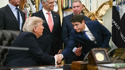 US President Donald Trump shakes hands with Richard Ascroft, CEO North America of Sun Pharma, during an announcement on Healthcare Affordability in the Oval Office of the White House in Washington, DC on August 31, 2026. 