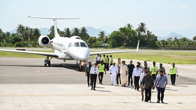 Tamil Nadu Chief Minister C. Joseph Vijay waves as he arrives at the airport for the opening of the sluice gates of the Stanley Reservoir for irrigation in the Cauvery delta districts at Mettur, in Salem on Tuesday. (@CMOTamilnadu X) Tamil Nadu Chief Minister C. Joseph Vijay waves as he arrives at the airport for the opening of the sluice gates of the Stanley Reservoir for irrigation in the Cauvery delta districts at Mettur, in Salem on Tuesday. (@CMOTamilnadu X)