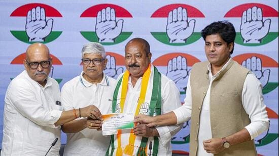 AIMIM national spokesperson Syed Asim Waqar joins the Congress in the presence of the party’s UP in-charge Rajendra Pal Gautam, UP Congress chief Ajay Rai, and AICC minority department chairman Imran Pratapgarhi in New Delhi on Wednesday. (PTI PHOTO)