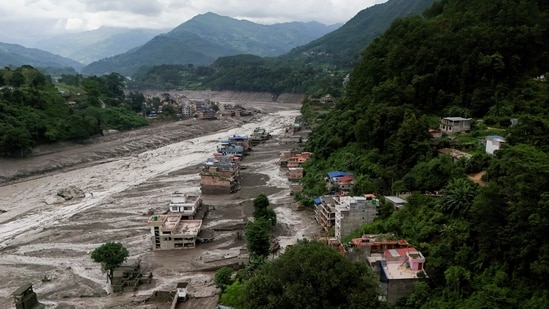 A drove view of mud covered properties following a flash flood at Trishuli in Nuwakot district, Nepal, August 26, 2026. 