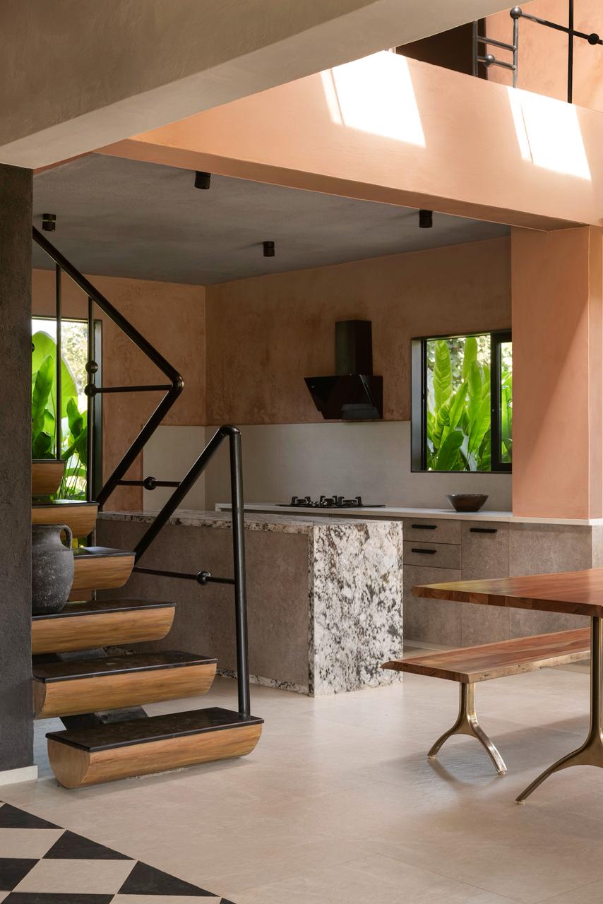 Terracotta-inspired walls and timber accents add warmth. Terracotta-inspired walls and timber accents add warmth.